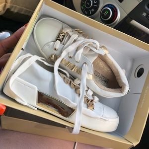 MK gold and white shoes